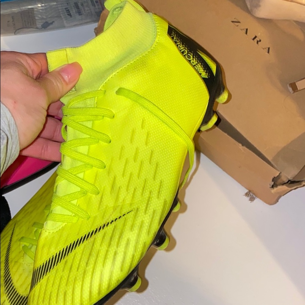 Soccer cleats and chin covers